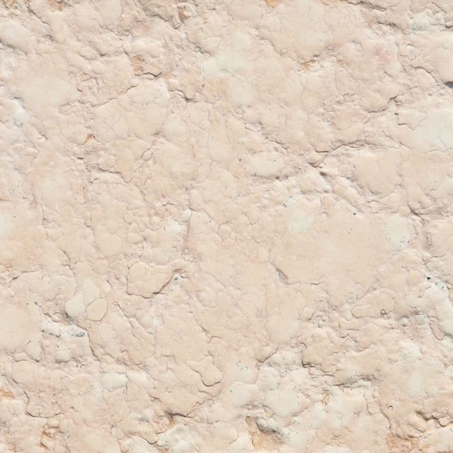 Finitura spazzolata sullo spacco di cava, pietra rosa